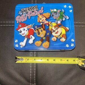 Team Paw Patrol Lunchbox Full Of Crayons. Different Colors  And Brands.